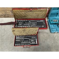 Two Britool socket sets, and two Makita drills