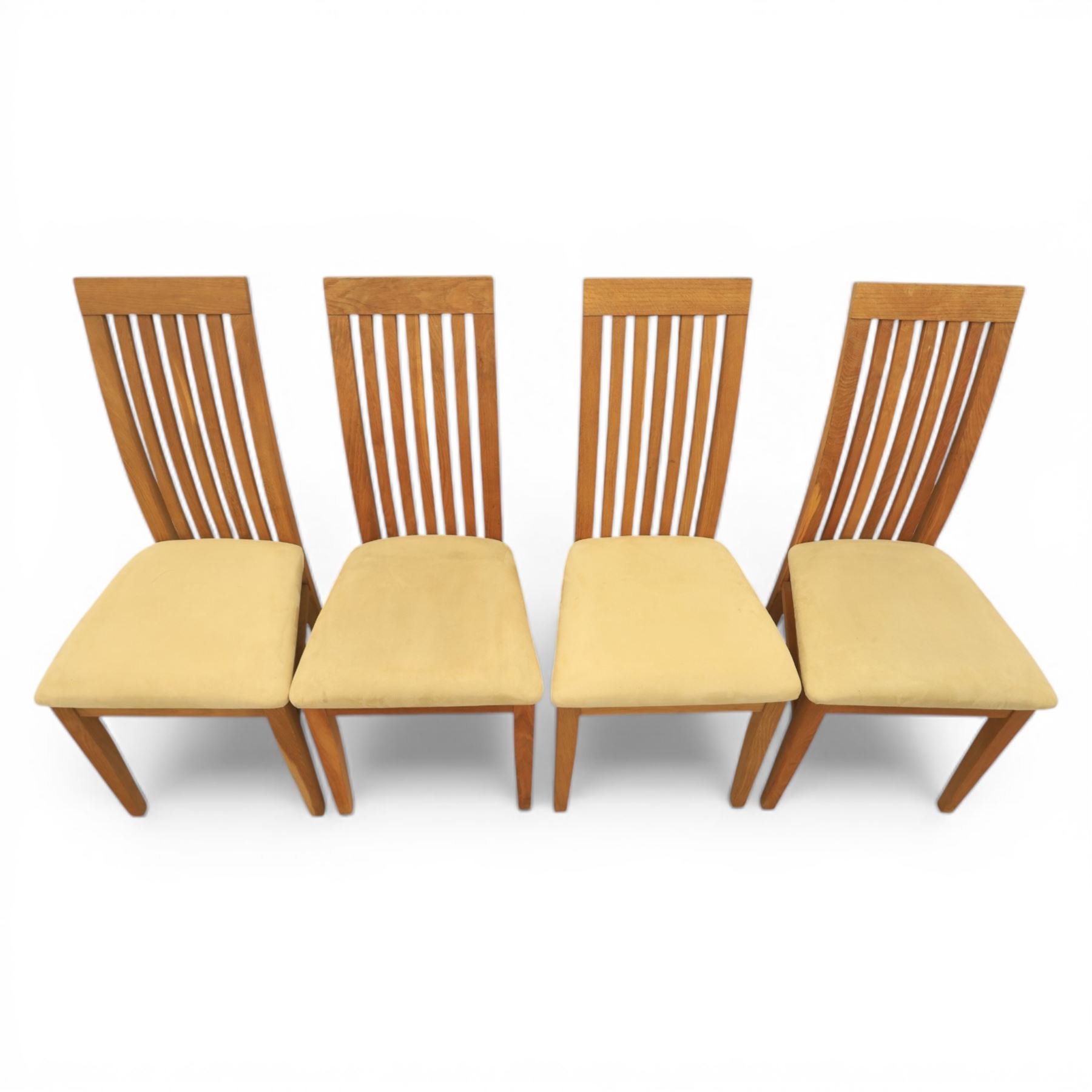 Contemporary teak dining suite comprising extending table and eight chairs, the table with rectangular plank top and one additional leaf extending to 210cm, supported on square tapering legs, the chairs with tall slatted backs and cream upholstered seats