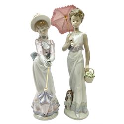 Two Lladro figures, comprising Garden Classic, no 7617 and Garden Song, no 7618, with original boxes and artists signature beneath, largest example H23cm