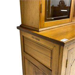 David Shackleton of Snainton - highly figured elm dresser, projecting moulded cornice over raised display cabinets and shelves, the base fitted with three central drawers and flanked by panelled cupboards, inscribed 'DS 1990'