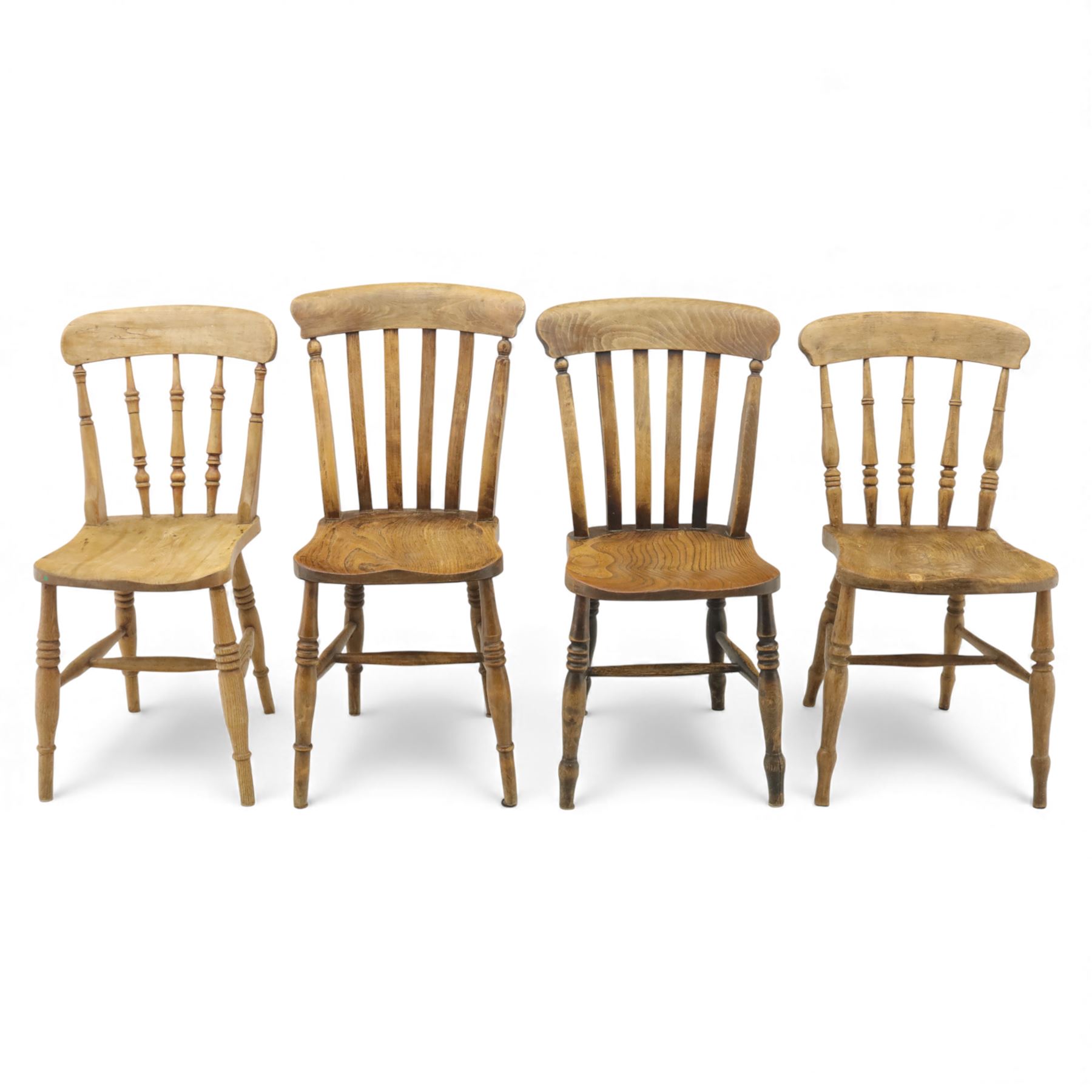 Eight Victorian farmhouse chairs in elm and beech, spindle-back frames with moulded seats, on turned and plain supports
