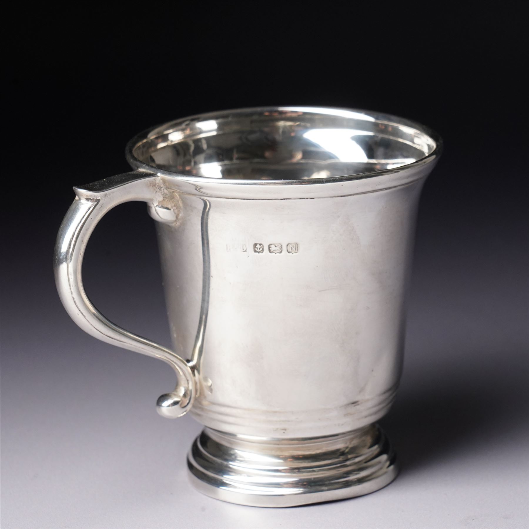 Silver christening mug  with loop handle engraved with initials H8cm Birmingham 1937 Maker possibly Roberts & Dore