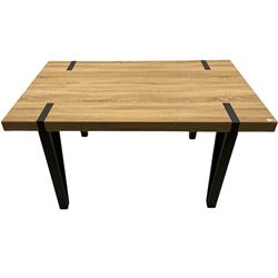 Modern light oak effect rectangular dining table, and four high back chairs.