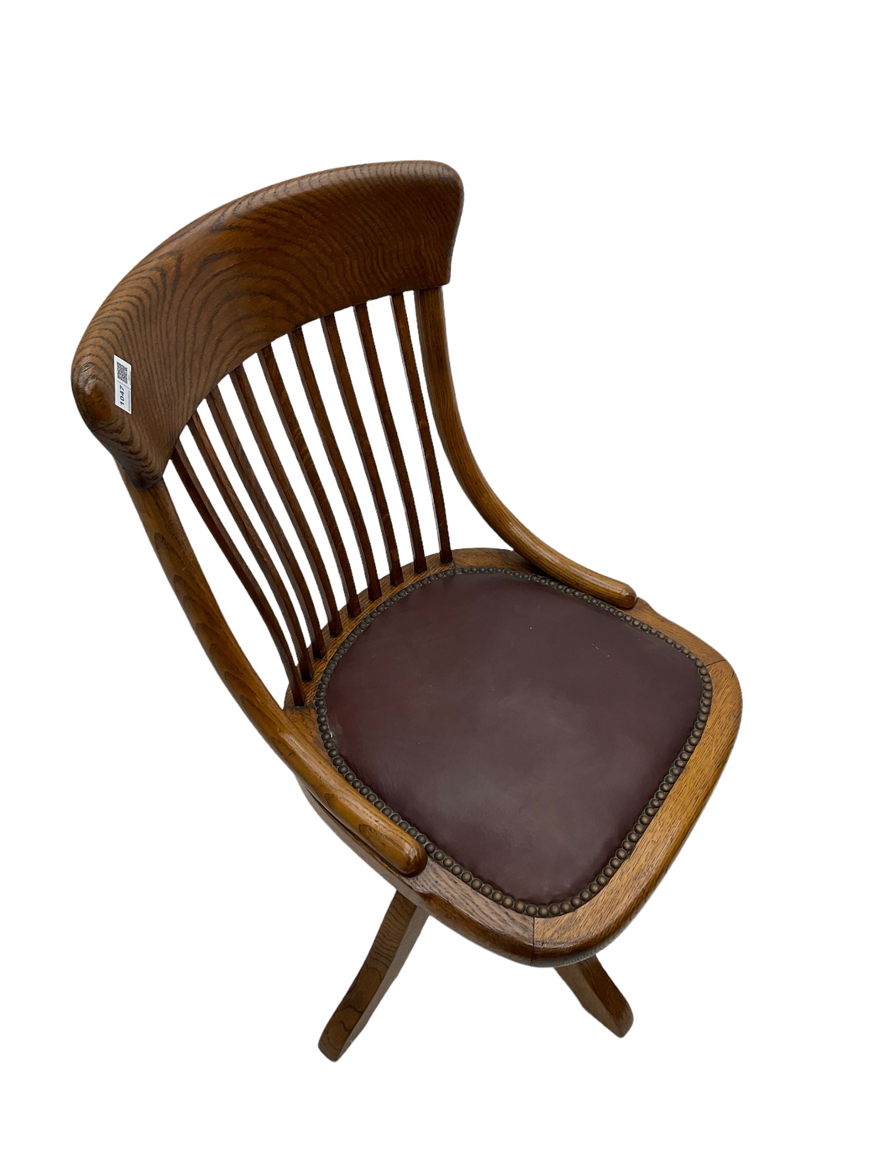 Early 20th century office oak adjustable swivel chair with studded leather seat