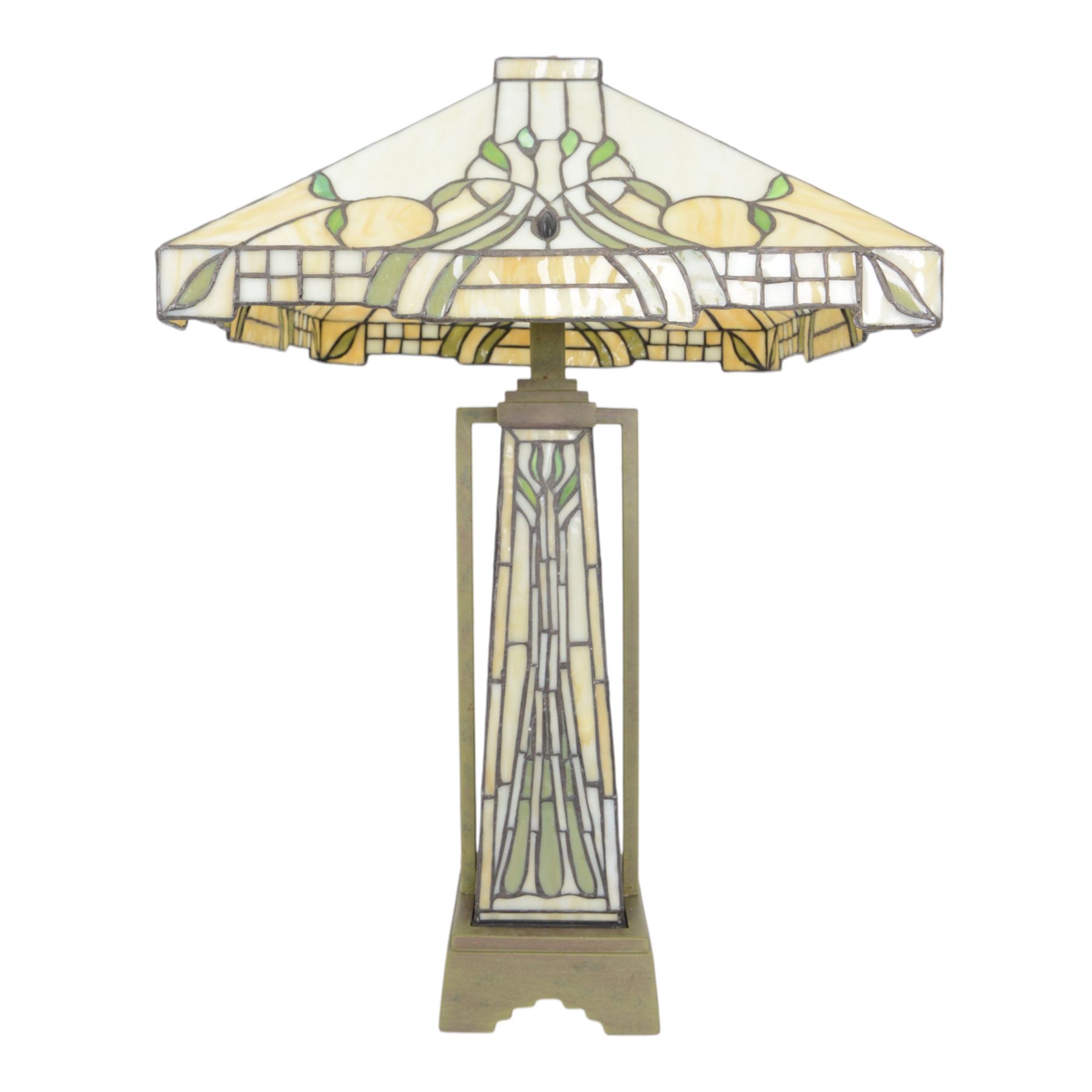 Tiffany style table lamp, the tapering stem and stepped pyramid shade, with naturalistic green foliate decoration on a cream ground, including shade H67cm
