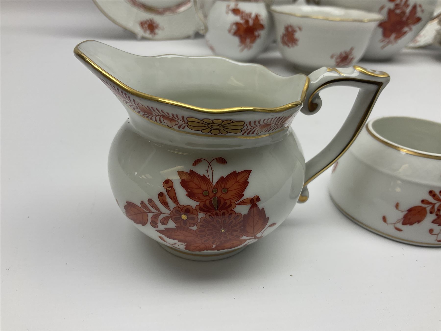 Herend Chinese Bouquet Rose pattern tea service comprising teapot, coffee pot, open sucrier, six cups and saucers, six tea plates, cream jug and stand, milk jug, two teabag holders, preserve pot, two leaf shaped dishes, four egg cups, salt & pepper pots, pair side plates and another plate
