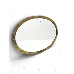 Early 20th century classical oval brass framed bevel edge mirror, W82cm, H56cm