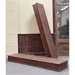 Pair of stained pine long boxes, early 20th century, with hinged lids and moulded base, on...