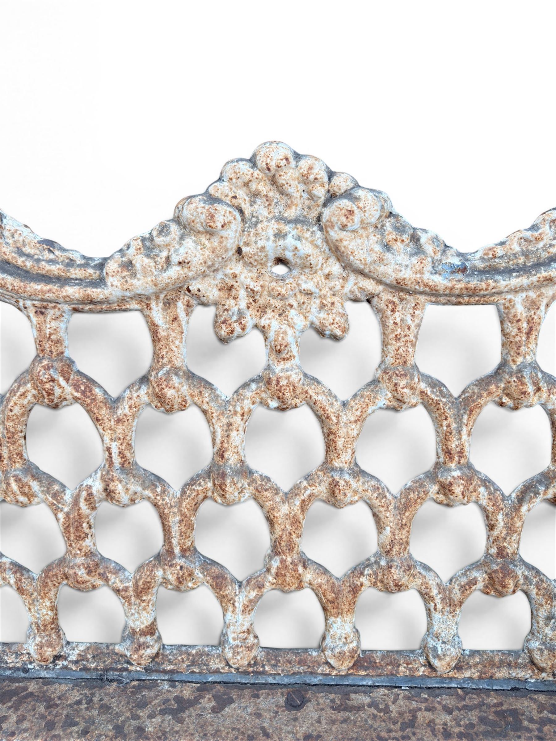 Victorian revival Carron Foundry design heavy cast iron two seat garden bench, scrolled arms with pierced lattice seat, finished in antique white paint