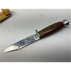 Graduated set of three Bowie knives by J. Nowill & Sons Sheffield England Est. AD1700, each with steel blade, brass cross-piece, stacked leather type grip and alloy pommel; largest blade 13cm and smallest 7.5cm; each in leather sheath (3)