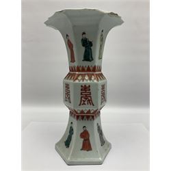 Chinese Kangxi gu vase, of hexagonal form with fluted rim, decorated in polychrome enamels with a male figure to each panel and red character marks to centre, with painted red leaf mark beneath, H32.5cm