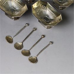 Set of four late Victorian silver open salts, of octagonal part fluted form, with four clam shell spoons, hallmarked Colen Hewer Cheshire, Birmingham 1896, salts H4cm, contained within fitted case