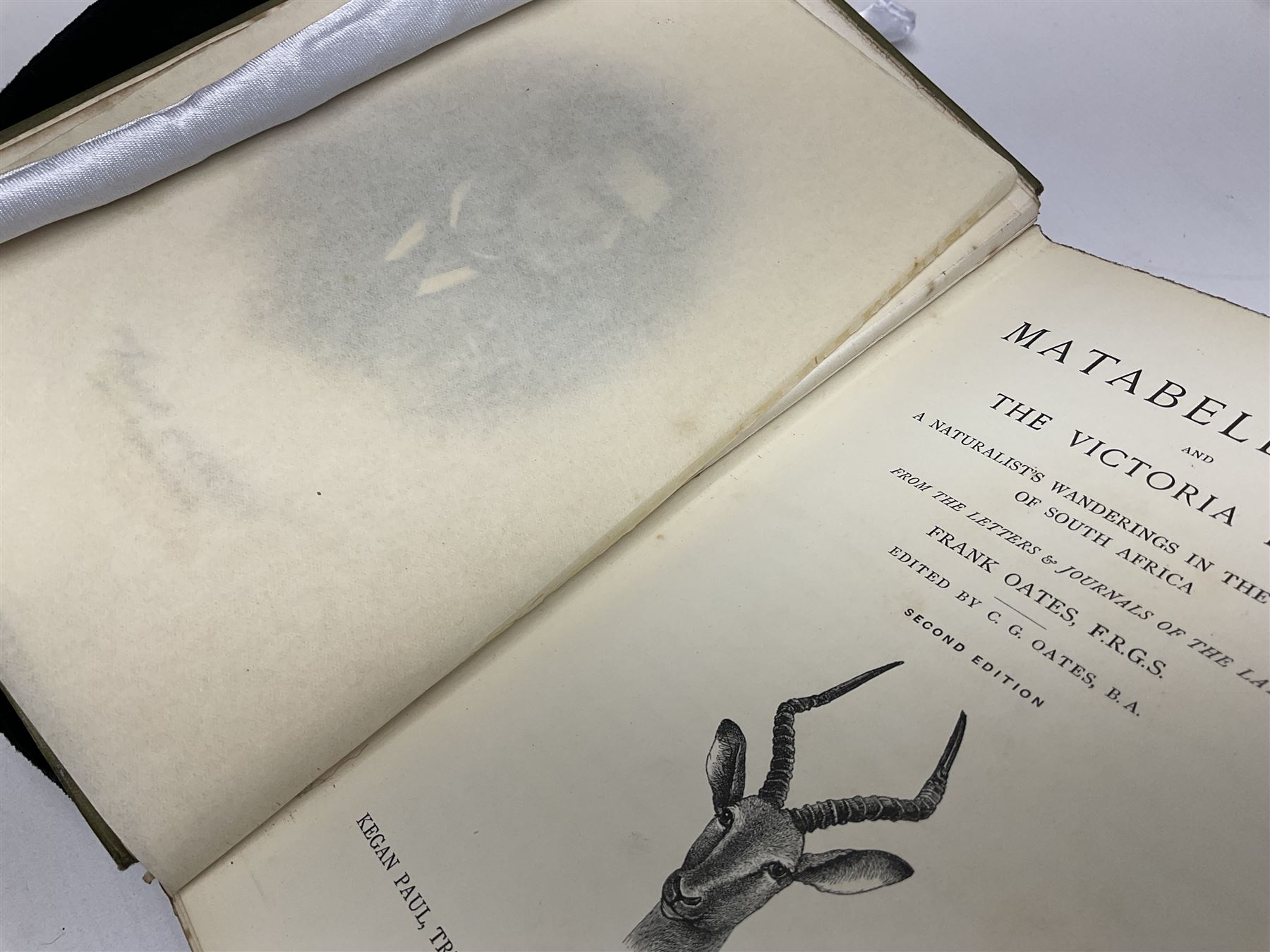 Frank Oates; Matabele Land and the Victoria Falls: A Naturalist`s Wanderings in the Interior of South Africa edited by C.G.Oates second edition, with half-title mounted engraved portrait, chromolithographed plates, lithographed natural history plates, folding engraved maps with partial hand-colouring plain plates and illustrations