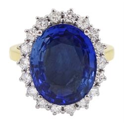 18ct gold oval unheated sapphire and round brilliant cut diamond cluster ring, hallmarked, sapphire 7.46 carat, with certificate