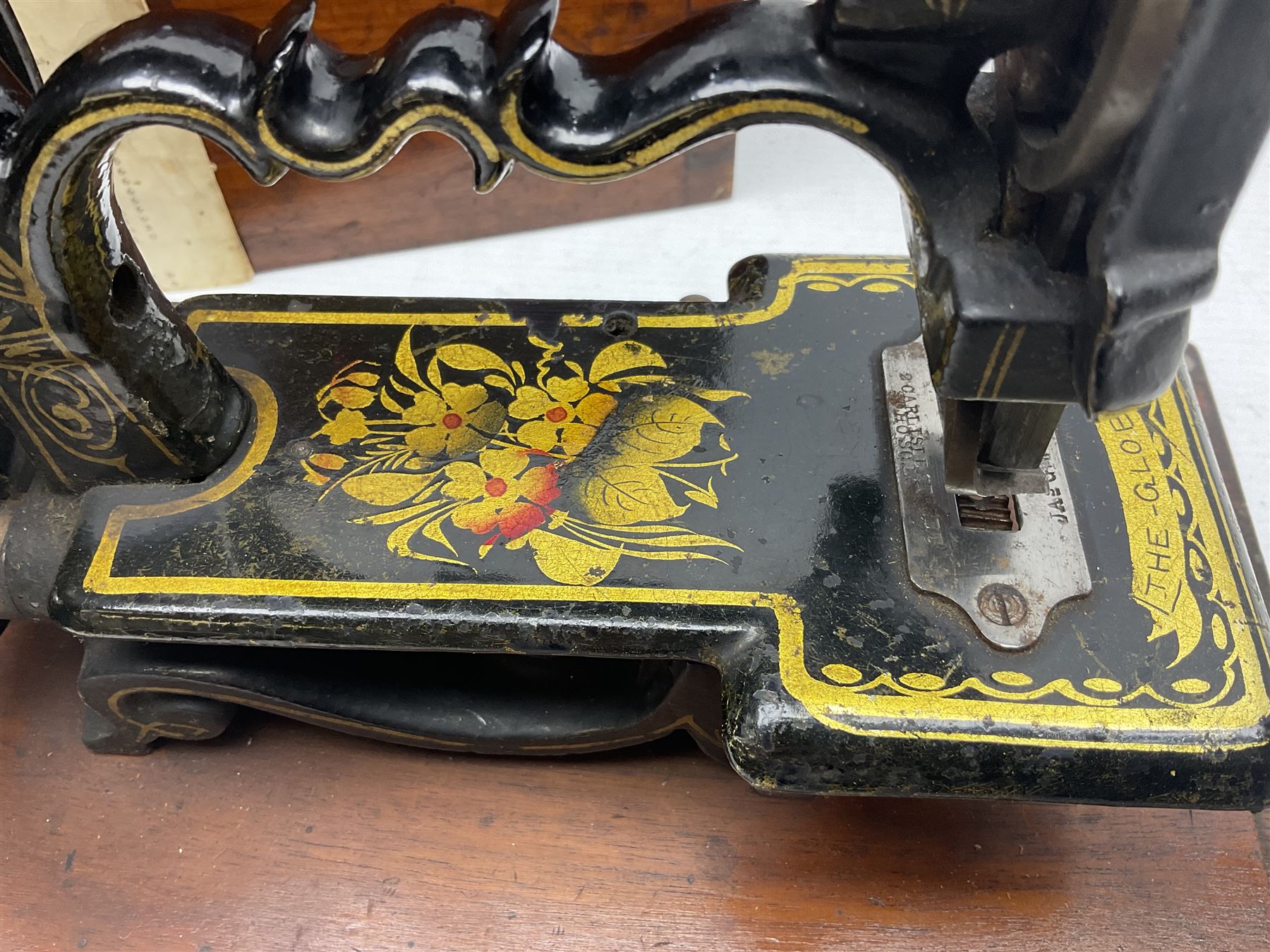 James G Weir 'The Globe' hand-cranked sewing machine, circa 1872, in black finish with gilt and flower painted decoration, the bed stamped Ja's G. Weir, 2 Carlisle Street, Soho Sq., London, with walnut locking carrying case and original manual, boxed H25cm 