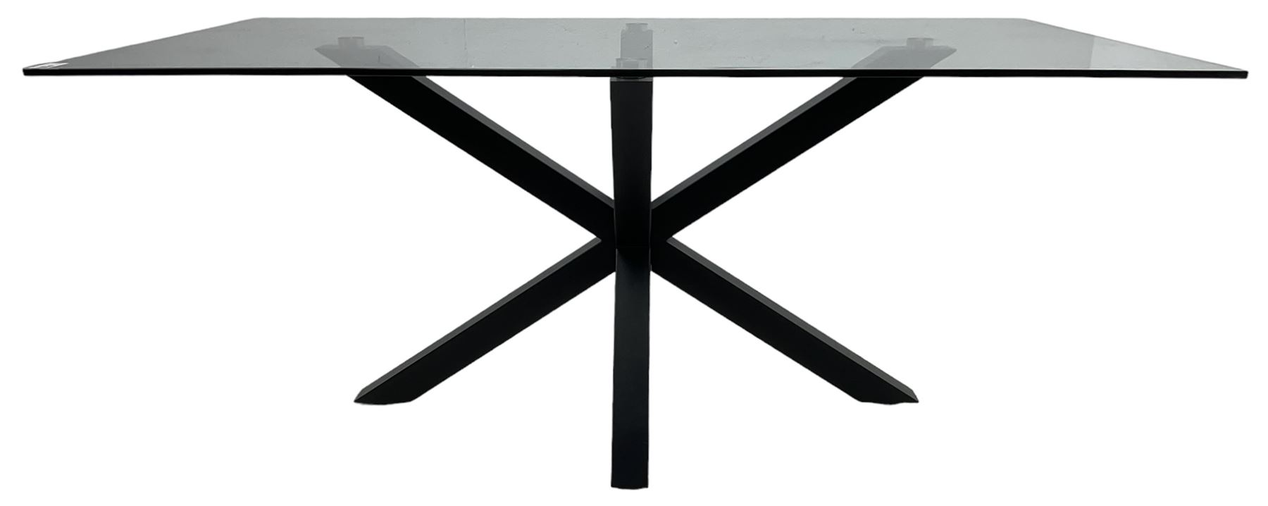 Contemporary glass and metal dining table, rectangular glass top on black finish steel X-framed base