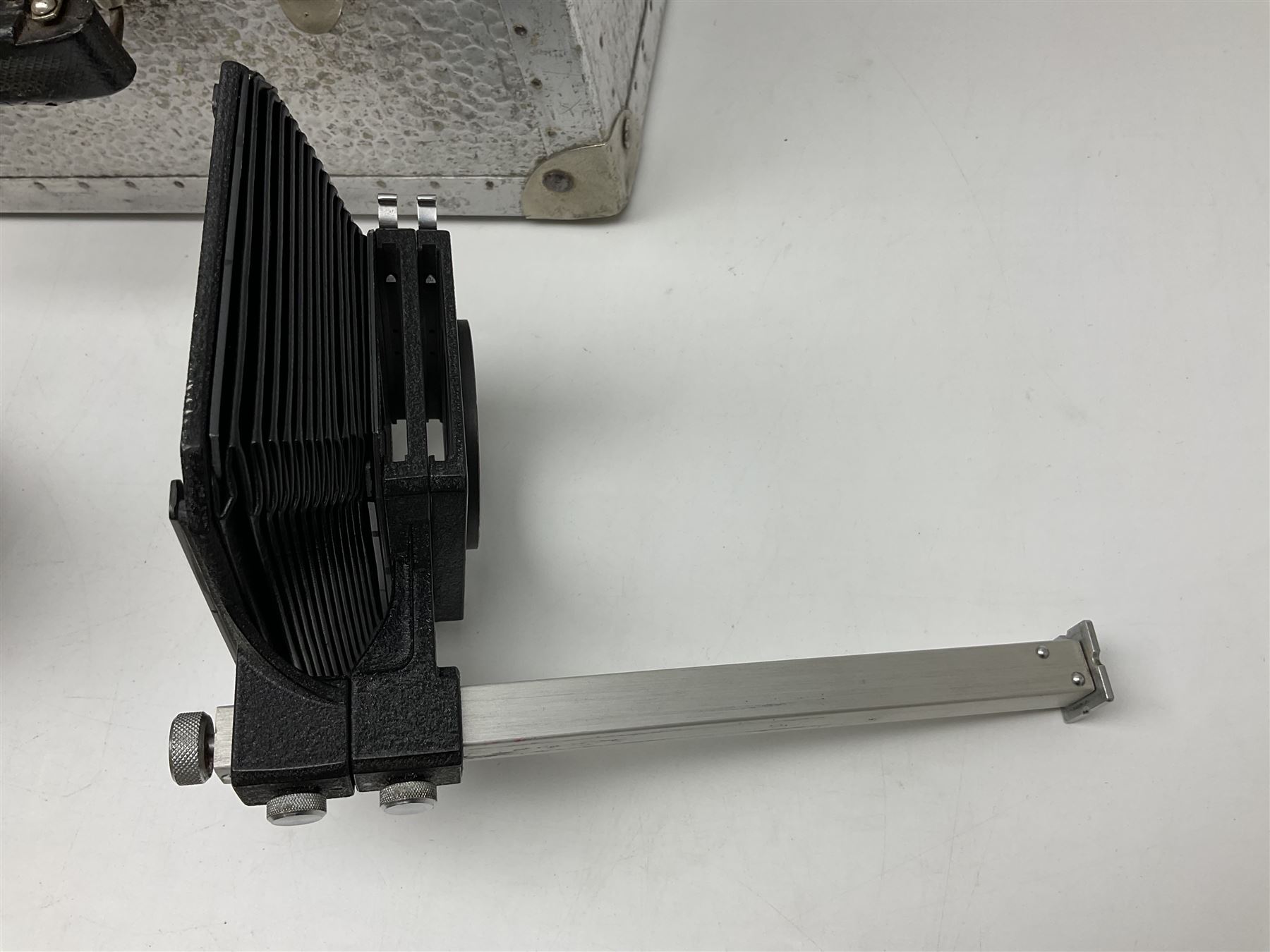 Arriflex 16SB camera body, serial no. 1784, with ' Carl Zeiss Distagon 1:2 f=8mm' lens, serial number 3860224, 'Carl Zeiss Jean Tessar 2/16' lens, serial no 3624355, camera pistol grip and other accessories, in fitted hard case