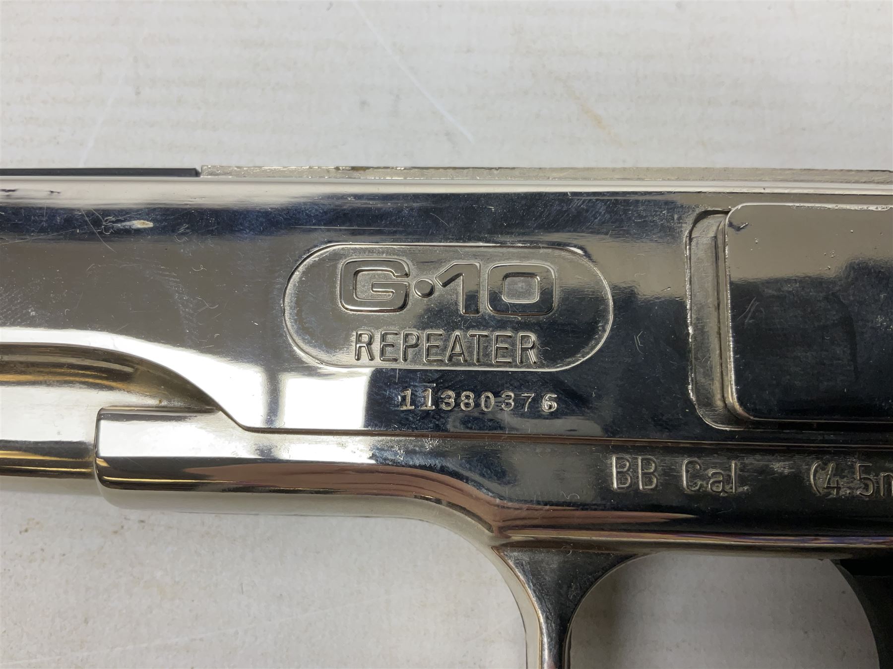 G-10 .177 20-shot BB Repeater air pistol with deluxe nickel plated finish; boxed with instructions