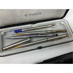 Quantity of Parker pens, predominantly ballpoint examples, to include engine turned gold plated example, stainless steel examples, various cases etc, together with three Mont Blanc ink bottles, all boxed