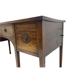 George III mahogany straight front sideboard, the rectangular top with walnut band, four drawers each with inlaid panel fitted with brass plate and loop handle, the left hand drawer with metal lining and divisions, square tapering supports with spade feet, small concealed compartment to right-hand side