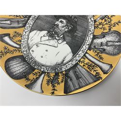 Fornasetti Grandi Maestri plate, depicting Giuseppe Verdi within a border of operatic emblems on gilt ground, with printed mark beneath, D25cm