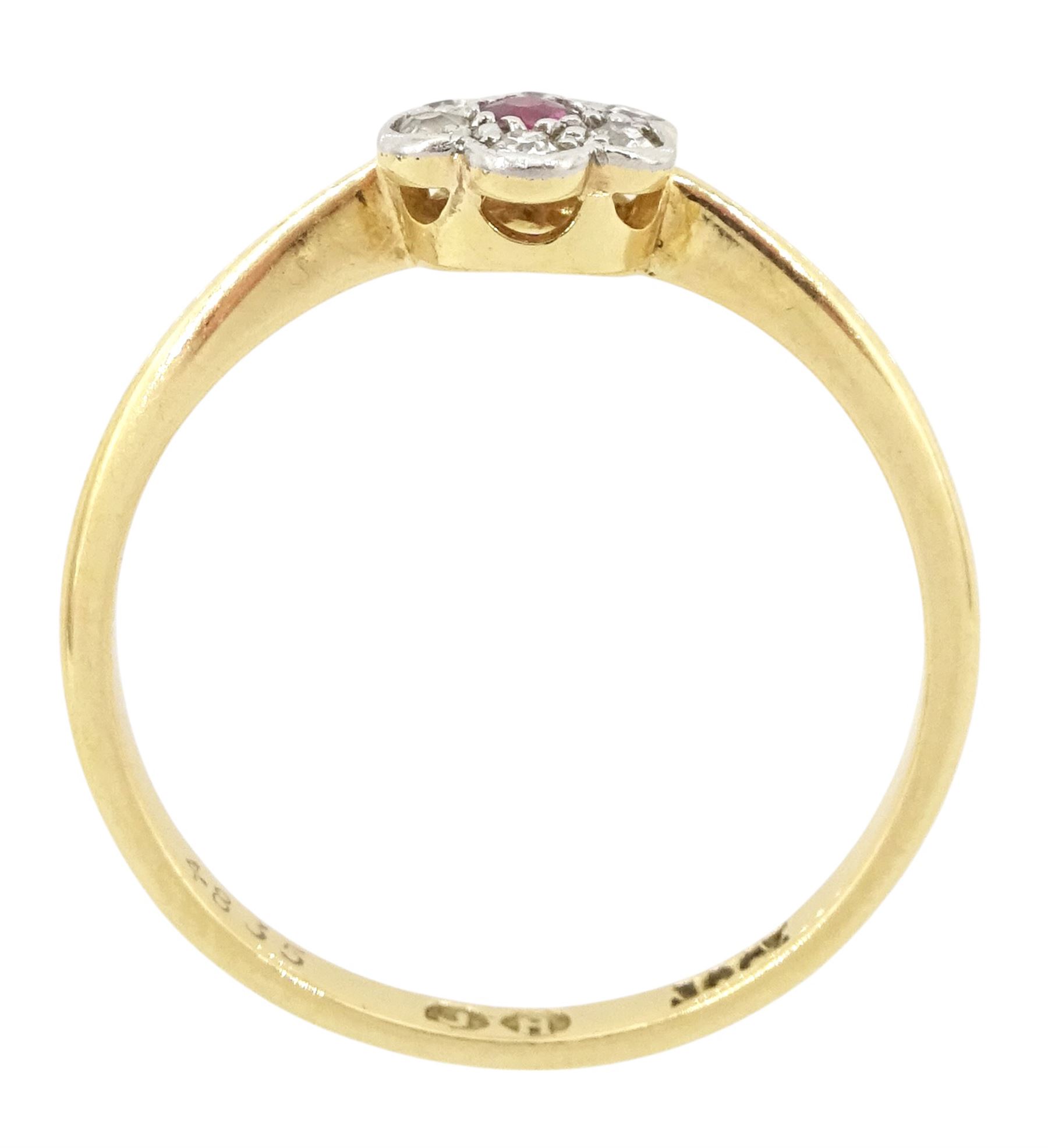 Early 20th century gold ruby and old cut diamond flower head cluster ring, stamped 18ct