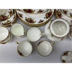 Royal Albert Old Country Roses pattern tea service for six place settings, comprising teacups and saucers, dinner plates, teapot, jug and sucrier, 