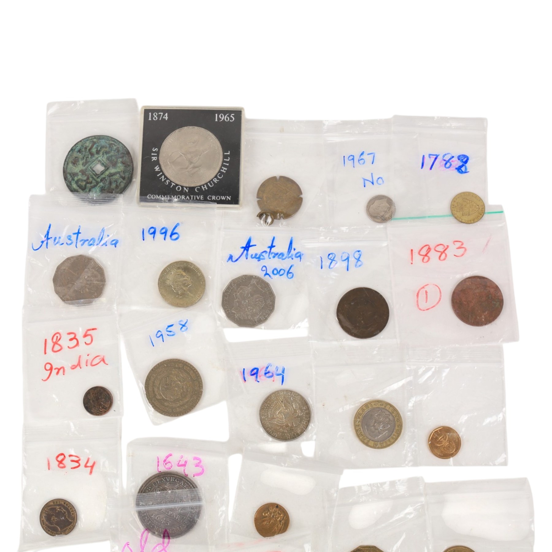 Small group of coins, including United States of America 1921 'Morgan silver one dollar, South Africa George VI 1937 silver two and a half shillings, reproduction Charles I Triple Unite, George IIII 1834 farthing, world coins, etc