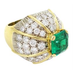18ct white and yellow gold emerald and diamond dome ring, octagonal cut emerald, surrounded by eight sections of pave set round brilliant cut diamonds, emerald approx 3.65 carat, total diamond weight approx 4.00 carat