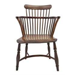 Early 19th century elm and yew wood Thames Valley comb back armchair, dished elm seat, turned supports jointed by crinoline stretcher, W54cm, seat height - 41cm
