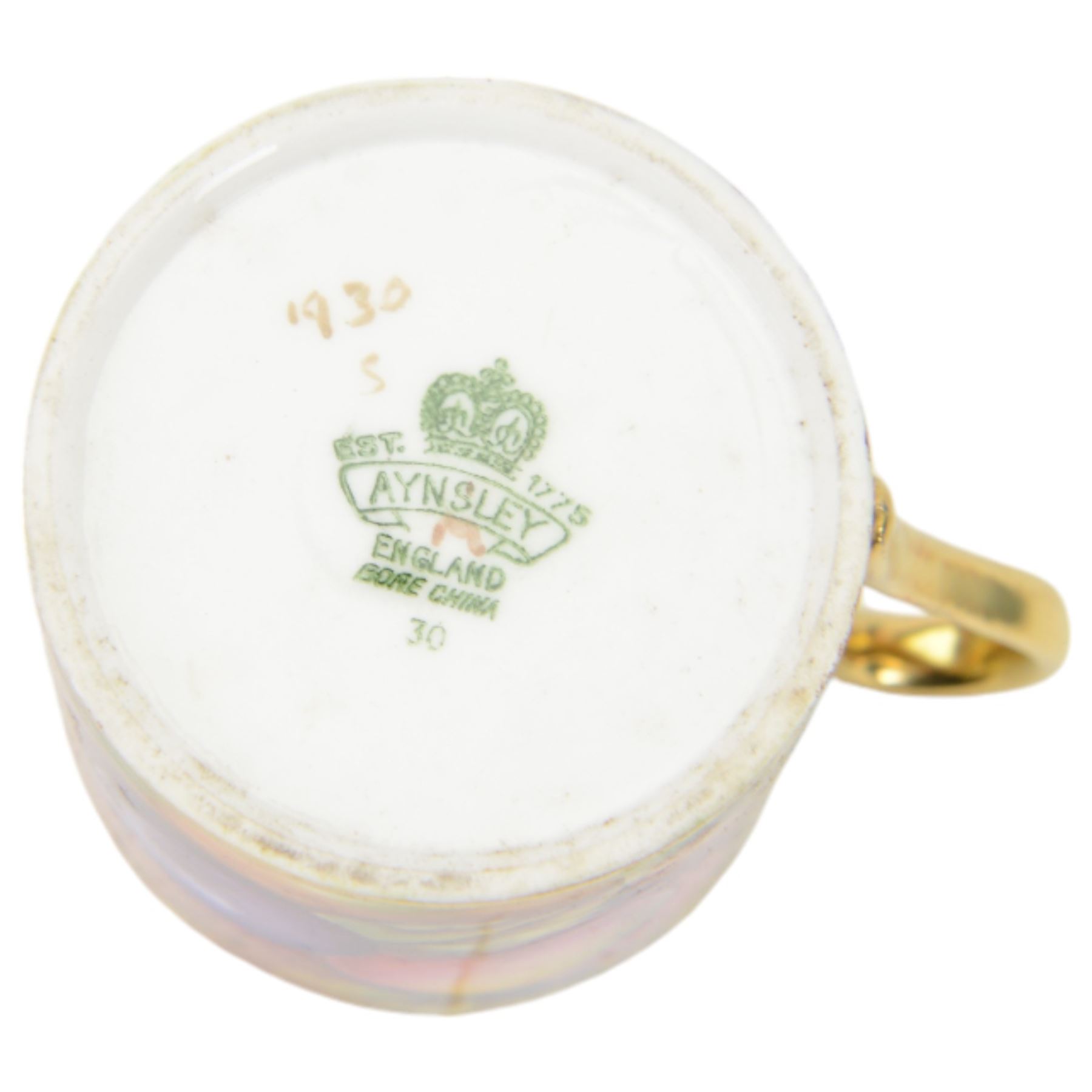 Aynsley fruit pattern, set of six coffee cans and saucers, gilded and decorated with fruit signed by N Brunt, in the original box, can H6cm