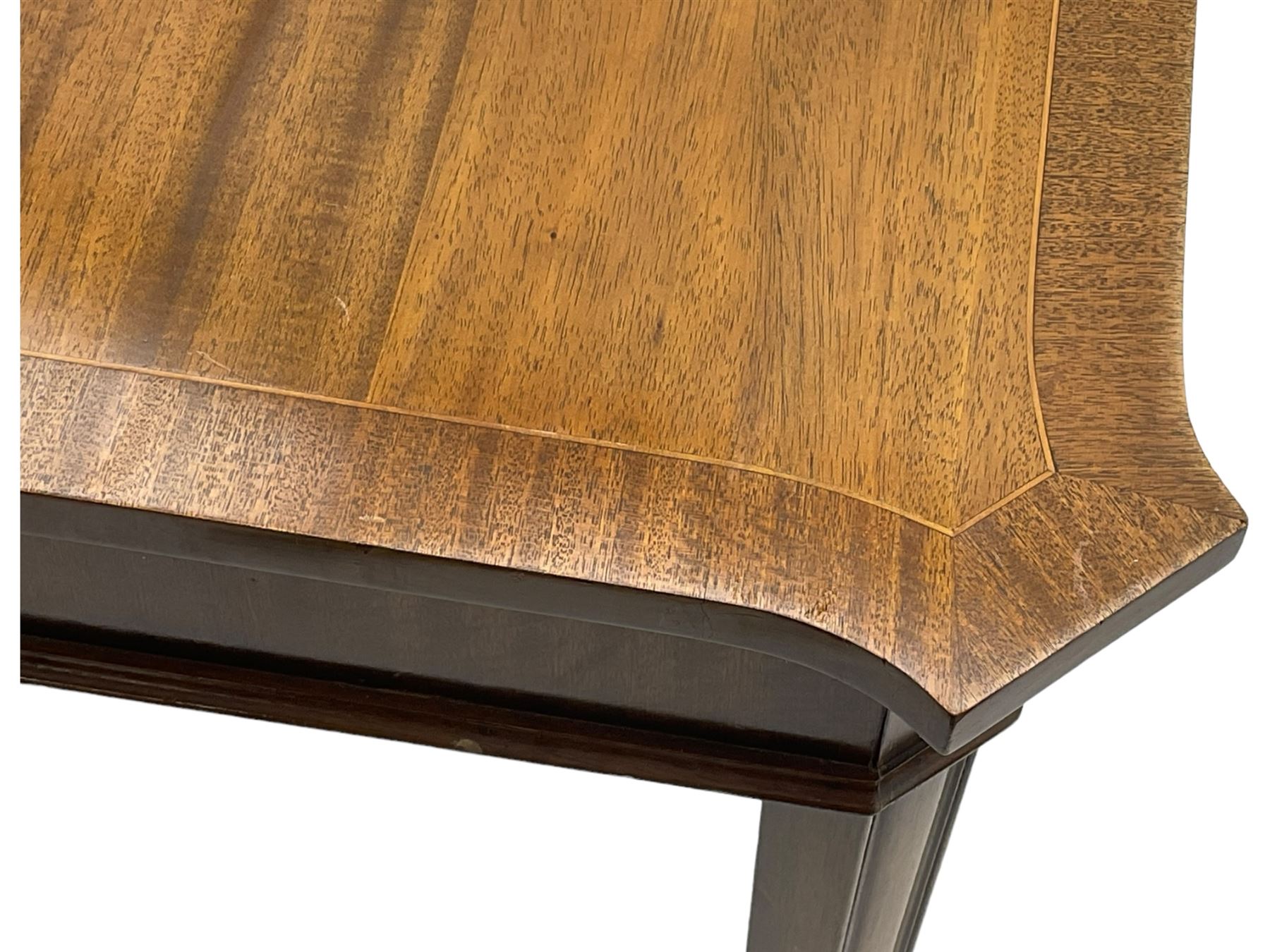 Regency design mahogany extending dining table, rectangular top with extending canted corners, pull-out action with additional leaf (84cm x 136cm - 182cm, H76cm); set of eight Regency design mahogany dining chairs with rope twist rails