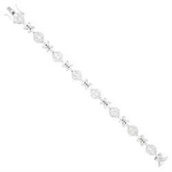 18ct white gold diamond bracelet, eight circular, pave set round brilliant cut and baguett...