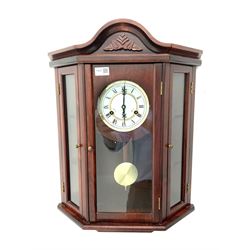 Contemporary stained beech wall clock, twin train 31-day movement striking on coil