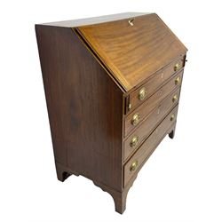 George III mahogany bureau, the fall-front banded and with boxwood stringing, enclosing fitted interior with pigeonholes and drawers surrounding a central cupboard with inlaid shell motif, the base with four graduating cock-beaded drawers, each with pressed brass handle plates with central lion masks and ivory escutcheons, on shaped bracket feet
This item has been registered for sale under Section 10 of the APHA Ivory Act