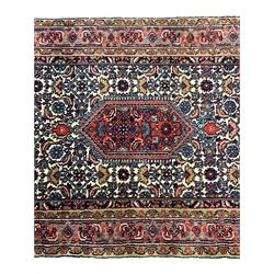 Persian Bidjar ivory ground runner, decorated with three medallions in a field of Herati motifs, three band border with overall floral design