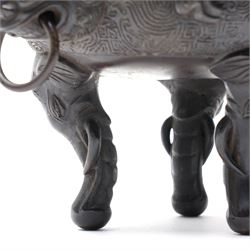 Early 19th century Chinese Qing Dynasty bronze censer, the body of globular form with circular neck and twin cast lion mask ring handles, decorated with applied figures of a monkey, deer and bird, against a key fret detailed ground, the whole upon three zoomorphic elephant feet, H16.4cm D12cm