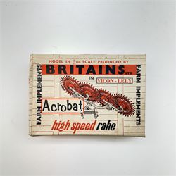 Britains 1:32 scale farm implements, vehicles and figures,  comprising 9563 Hay Baler, 9539 Seed Drill, 9534 Disc Harrow, 9537 Acrobat Rake, 9530 Three Furrow Plough, 9547 Horse Box with Horse, 9576 Farm Land Rover, 2078 male Rider with Horse, 9533 Roller, 9538 Vari-Spreader, 9536 Cultivator, three 1742 Hay Bales, 1740 Milk Churns and 1741 Sacks, all boxed, together with trees, walls, buildings and loose vehicles