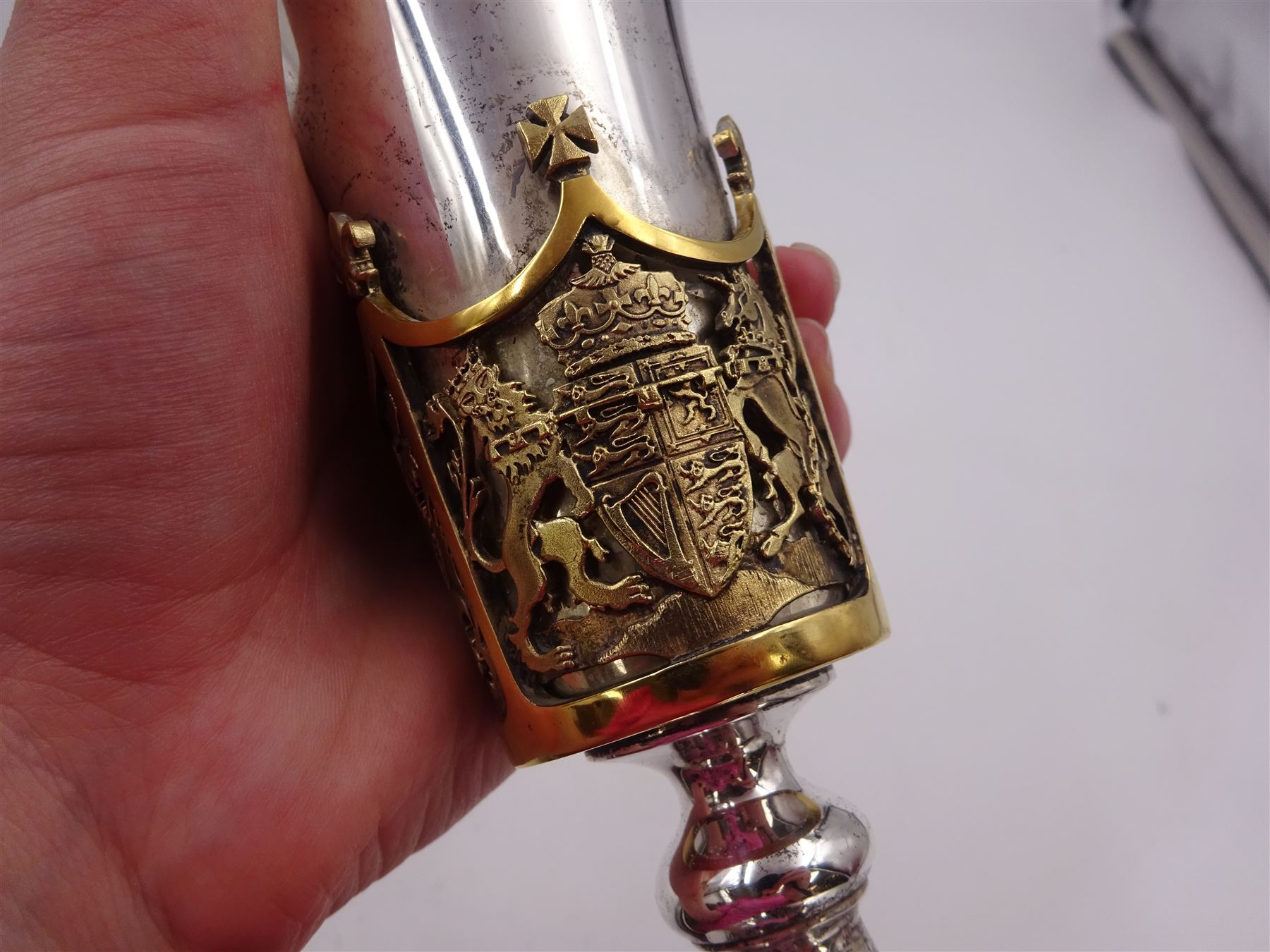 Modern limited edition silver Westminster Abbey Royal Wedding goblet, commemorating the marriage of HRH Prince Andrew and Miss Sarah Ferguson on the 23rd of July 1986, designed by Hector Miller for Aurum, the tapering cylindrical bowl with gilt interior and parcel gilt pierced band to base depicting the Royal Arms, upon knopped stem and circular stepped foot with floral parcel gilt rim, no. 483/750,  hallmarked Hector Miller, London 1986, H17cm