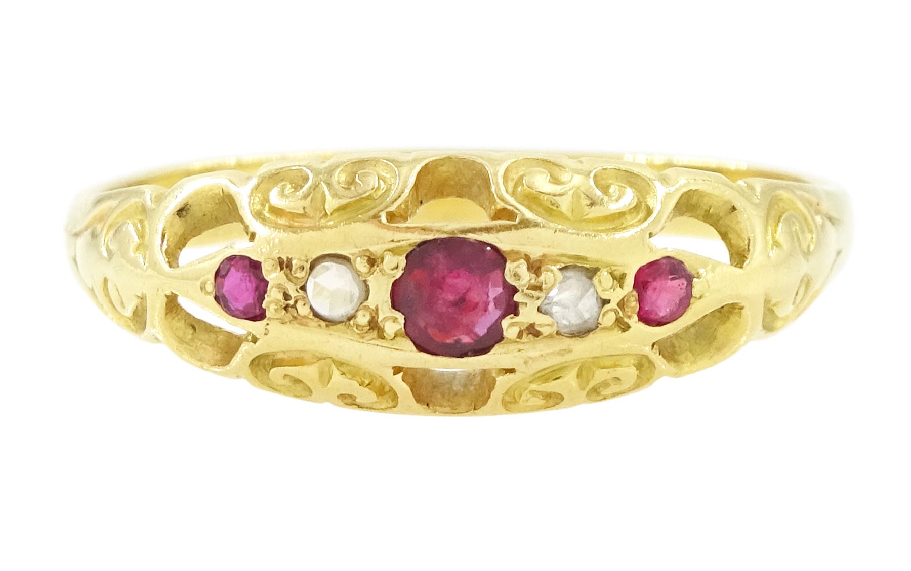 18ct gold ruby and diamond ring, five alternate round cut rubies and rose cut diamonds, in a scroll design setting, Sheffield 2004