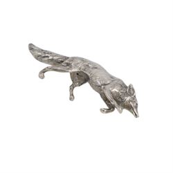 German silver model of a prowling fox, stamped Germany Sterling to underside of tail, together with a Continental silver model of a hair, with London import mark for 1971, tallest H6cm 