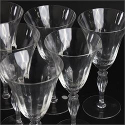 Set of six Murano clear glass wine glasses, each with part moulded fluted flared bowl, upon a knopped and fluted baluster stem and spreading circular foot, with etched marks beneath, H19.5cm