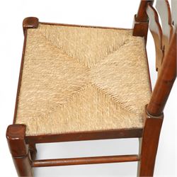 Mid-20th-century set of six elm ladderback chairs, with rush seat and five shaped horizontal back splats, turned front legs, and stretchers 