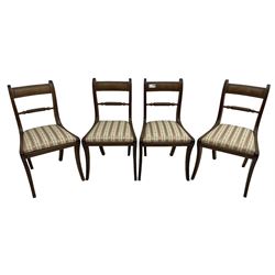 Set of four Regency period mahogany dining chairs, rope-twist centre back bar over pink and ivory floral patterned drop-in seats, on reed moulded sabre supports