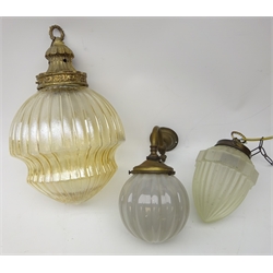  Early 20th century wall mounted light fitting, brass mount with globular lobed glass shade and two other pendant glass light fittings (3)  