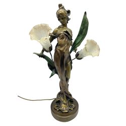 Art Nouveau style lamp in the from of a woman with two foliate lampshades, H69cm