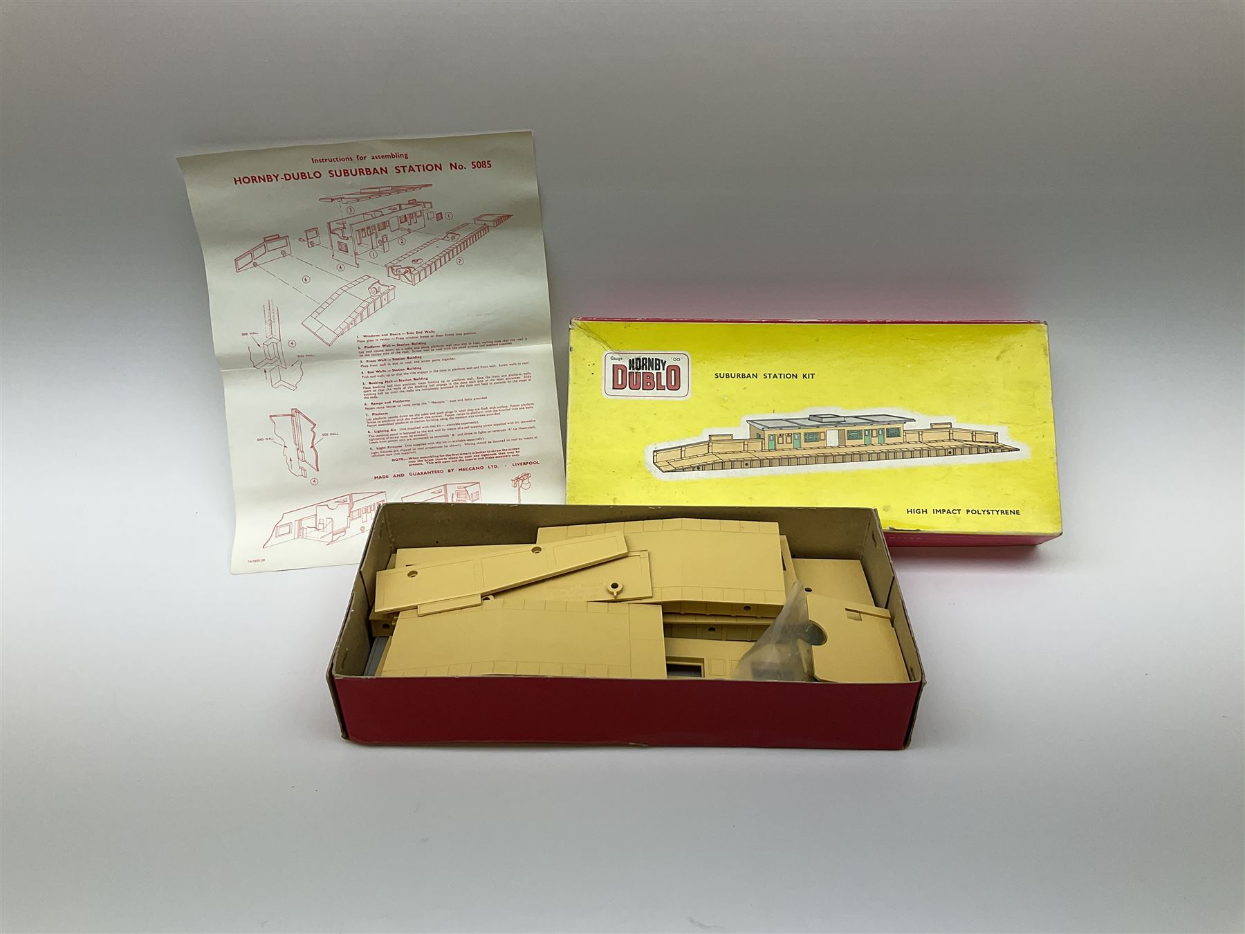 Hornby Dublo - 5006 Engine Shed Extension Kit; 5085 Suburban Station Kit with instructions; and 5030 Island Platform Kit; all in pictorial boxes; and Goods Depot Moulded Kit in box base only (4)