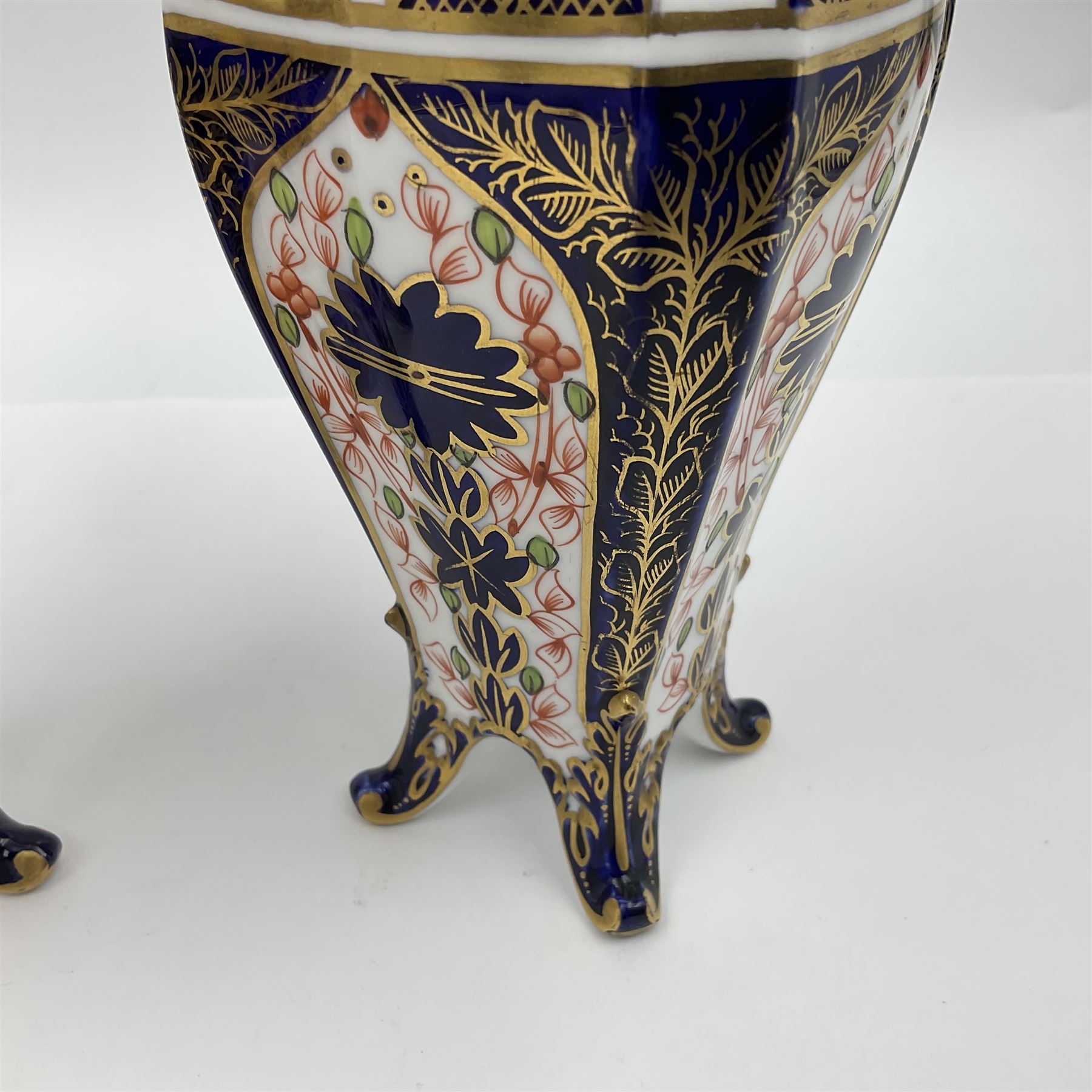 Pair of early 20th century Royal Crown Derby Imari 1128 pattern vases, of tapering straight sided form with waisted neck and frilled rim, upon four splayed feet, with printed and painted marks beneath including illustration date codes for 1911 and 1920, H17cm