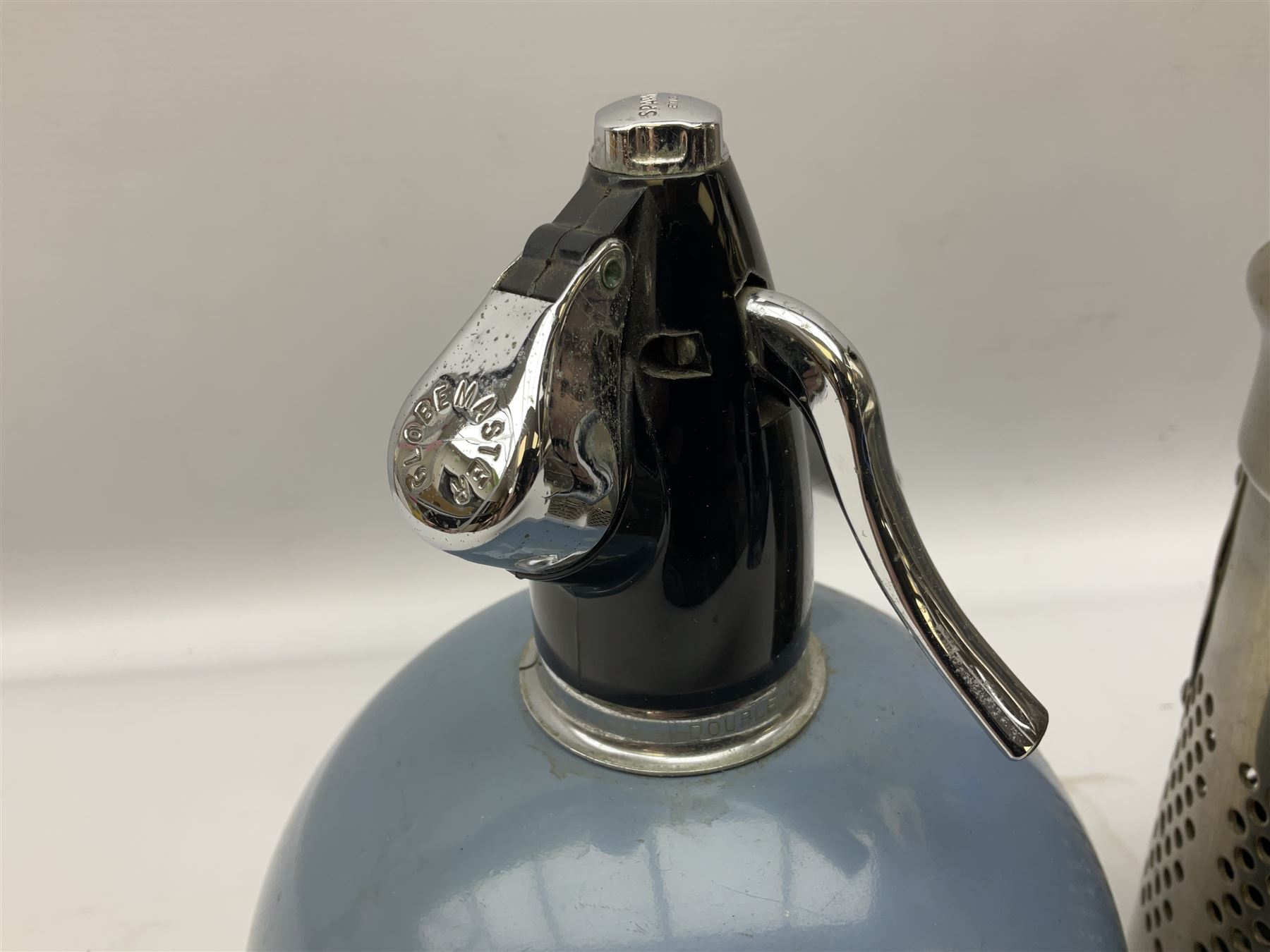 Sparklet 'The Prana' soda siphon charger, together with a Sparklets 'Globemaster' soda siphon in blue, circa 1960-80, tallest H38cm