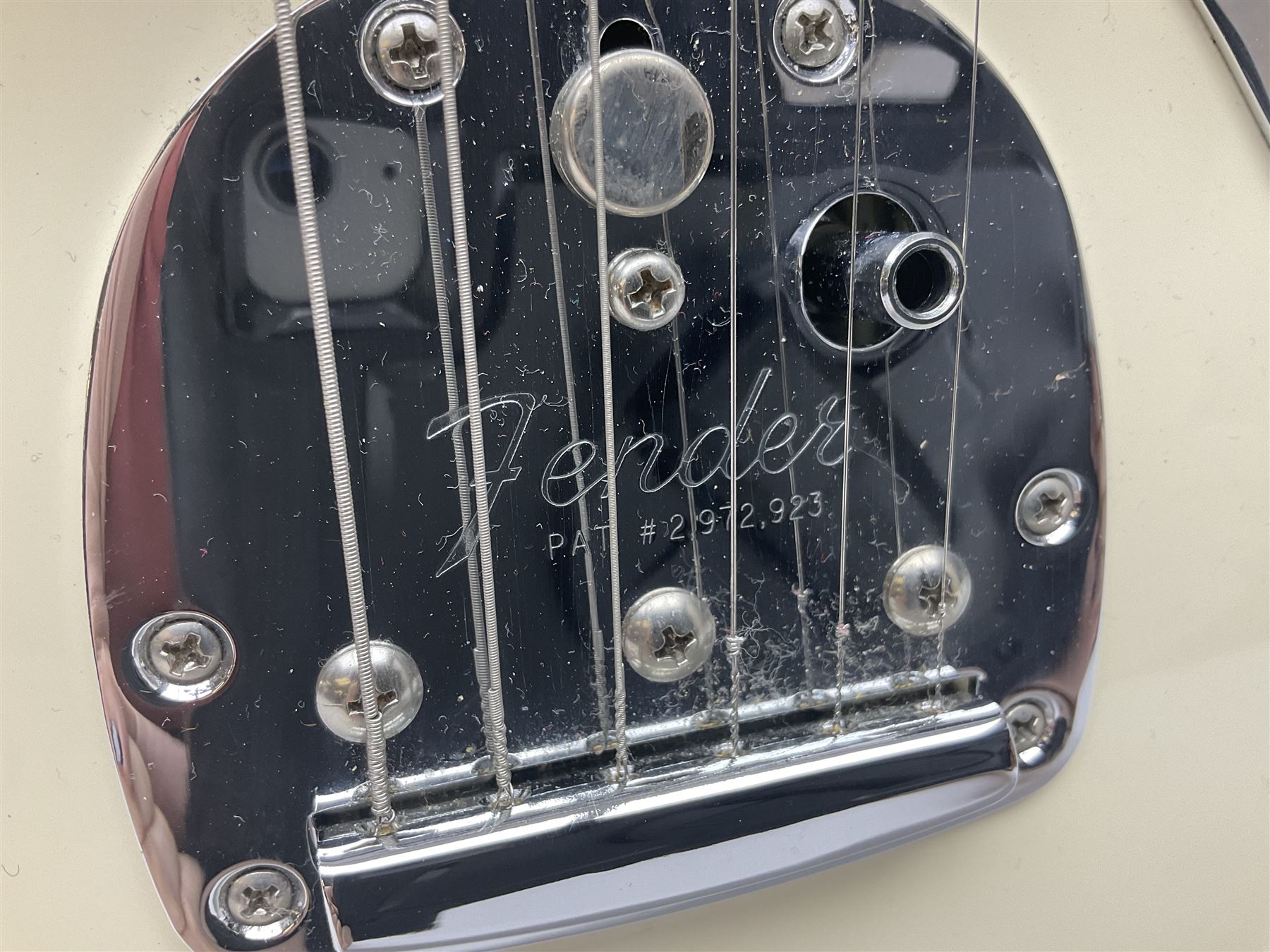 Mexican Fender Jaguar electric guitar with Humbucker pick-ups and tremolo arm, serial no.MX16741977, L101cm; in soft carrying case